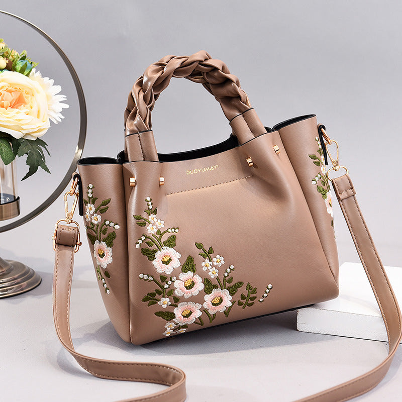 Braided handle bag with crossbody strap