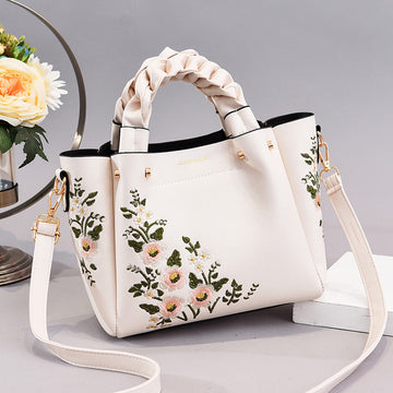 Braided handle tote bag floral embroidery front view