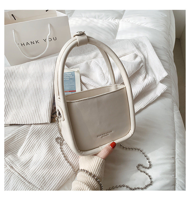 PU leather square bag styled with outfit